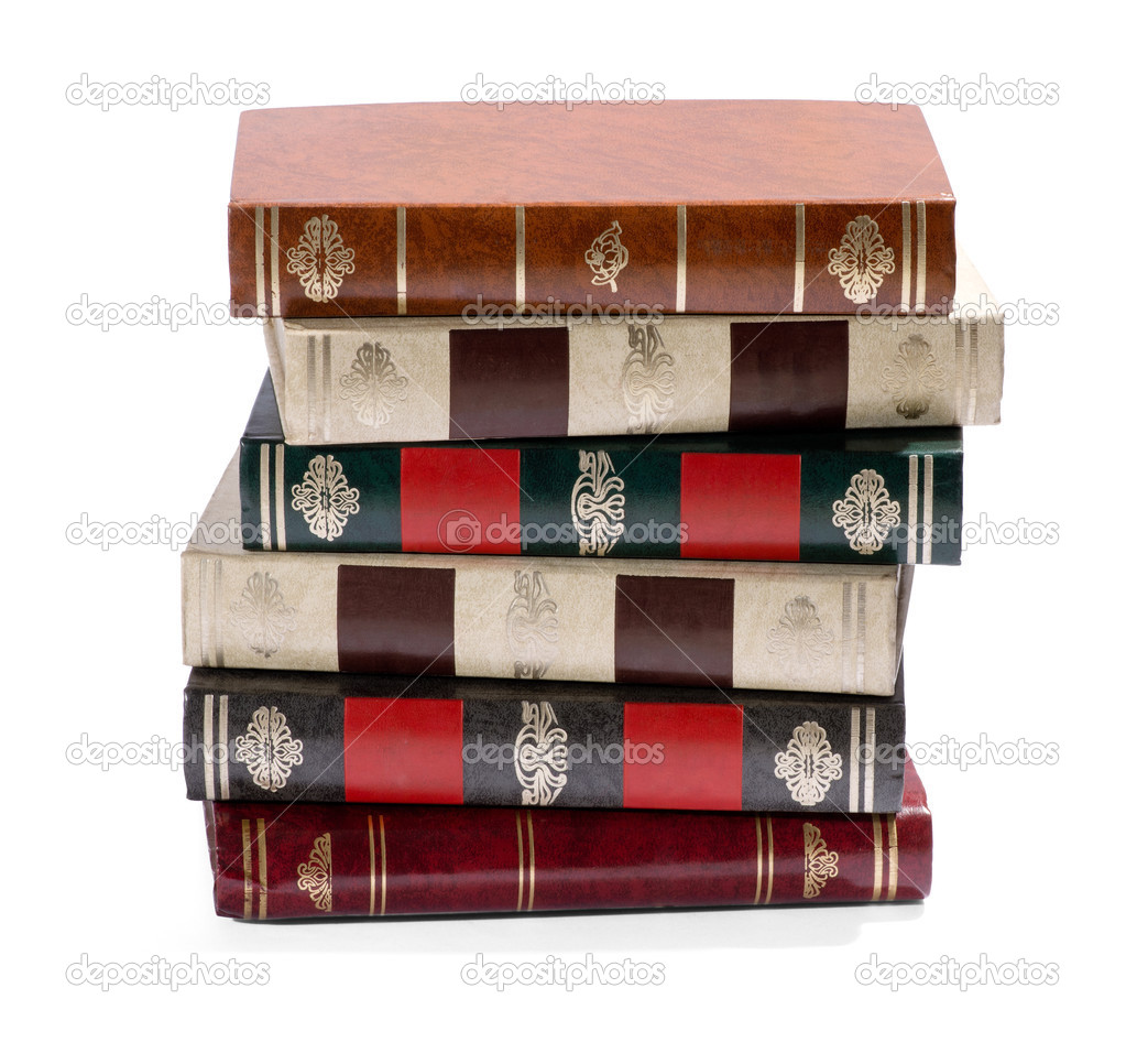 Stack of old books with gilt tooled spines