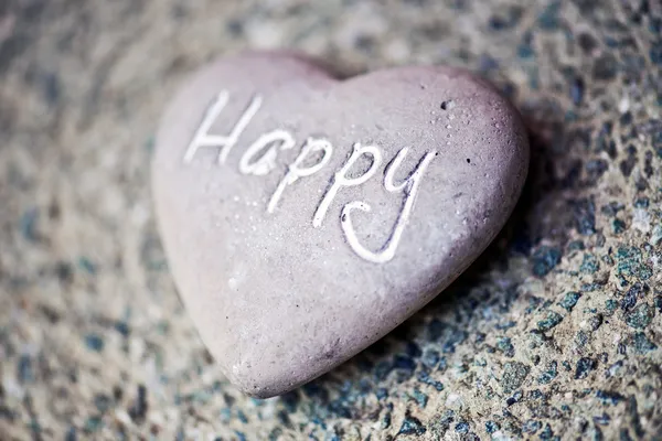 Stone heart with the word - Happy — Stock Photo, Image
