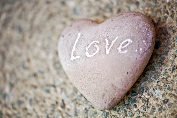 Stone heart with the word - Love - on it — Stock Photo, Image