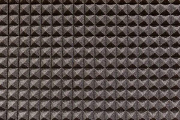 リハーサル室で幾何学模様の壁を吸収する茶色の音の完全なフレームの背景をテクスチャ — ストック写真
