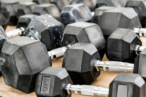 Bunch Heavy Dumbbells Placed Wooden Floor Weightlifting Training Gym — Stockfoto