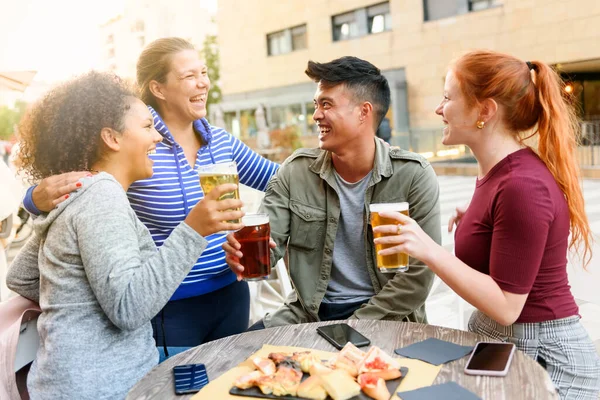 Happy Woman Laughing Embracing Diverse Friends Beer Sitting Pub Table — Foto Stock