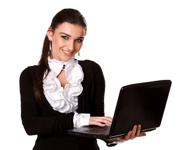 Beautiful brunette in a business style with a laptop — Stock Photo, Image