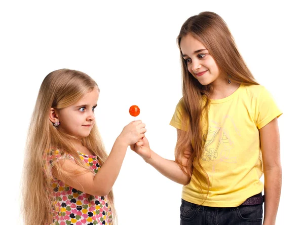 Two girls blonde with lollipop — Stock Photo, Image