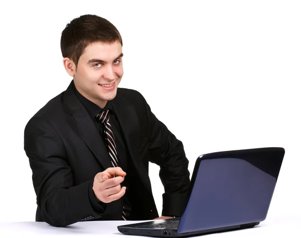 Businessman with laptop on desk — Stock Photo, Image