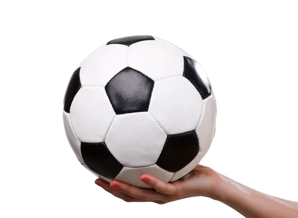 Classic football ball in hand — Stock Photo, Image