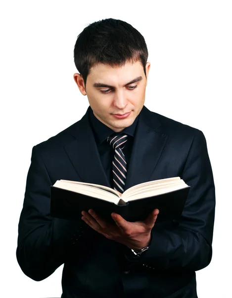 Geschäftsmann liest Buch — Stockfoto