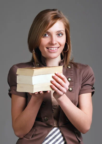 Mooi meisje met boeken — Stockfoto