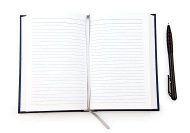 açık defter kalem ile