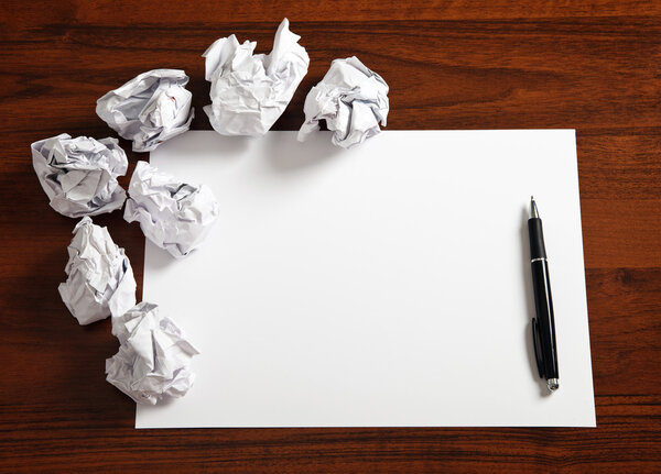 Blank paper with pen