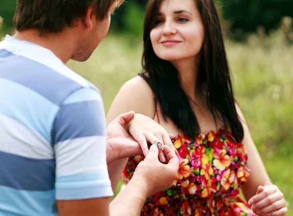 Happy young couple spending time together in park — Stock Photo, Image