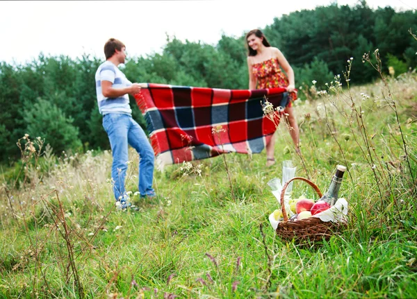 Happy young couple spending time together in park — Stock Photo, Image