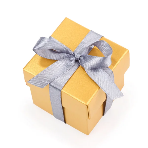 Yellow gift box with silwer ribbon — Stock Photo, Image