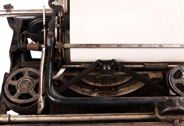 Feuille blanche de papier dans la machine à écrire — Photo