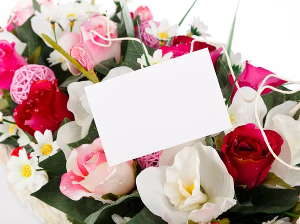 Gift card with artifical flowers — Stock Photo, Image