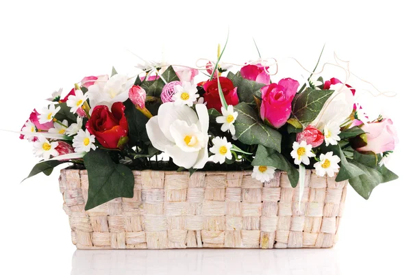 Artificial flowers in basket — Stock Photo, Image