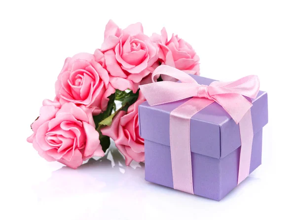 Pink flowers and gift box — Stock Photo, Image