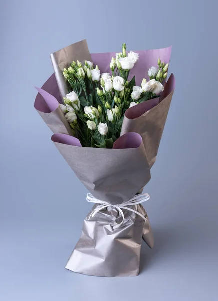 Large Festive Bouquet White Eustoma Stands Blue Background Flowers Wrapped — Stock fotografie