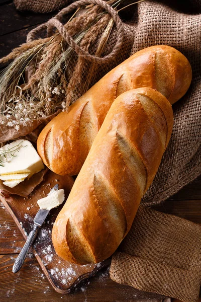 Rustic Breakfast Table Setting Two Freshly Baked Loaves Wooden Cutting — Stock Photo, Image