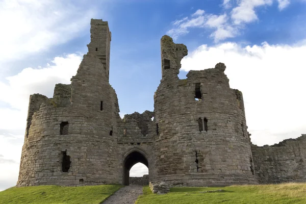 Castillo de Dunstanburgh Imágenes De Stock Sin Royalties Gratis