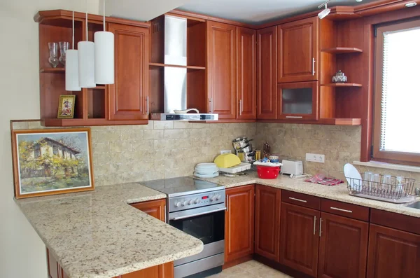 Modern cherry wood kitchen — Stock Photo, Image