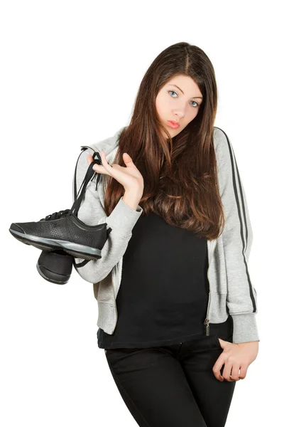 A beautiful girl gets on the trainers hip — Stock Photo, Image