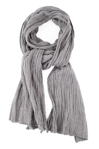 Una bufanda es gris ensartada en un nudo sobre un fondo blanco —  Fotos de Stock