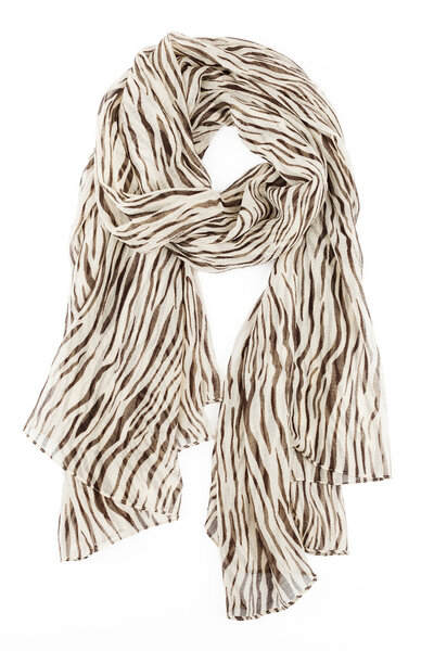 A scarf is silk beige with strakes strung on a knot