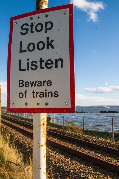 Stop beware of trains sign — Stock Photo, Image