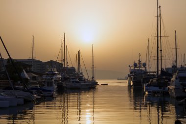 Sunset over Gibraltar Marina clipart