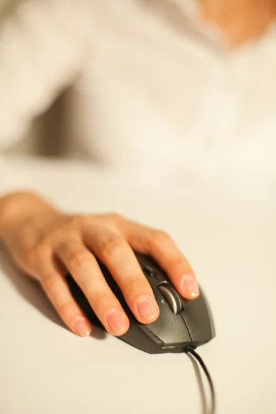 Female hand on mouse — Stock Photo, Image