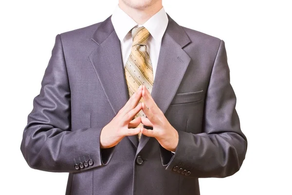 Powerful businessman folds hands together — Stock Photo, Image