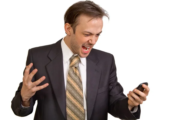 Angry businessman screams at phone — Stock Photo, Image