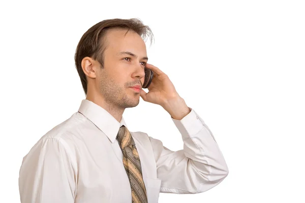 Zakenman in wit overhemd gesprekken op telefoon — Stockfoto