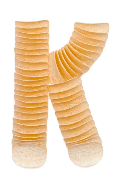 Letter K composed of chips — Stock Photo, Image