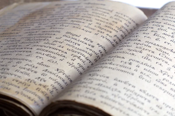 Old opened book, selective focus, isolated on white — Stock Photo, Image