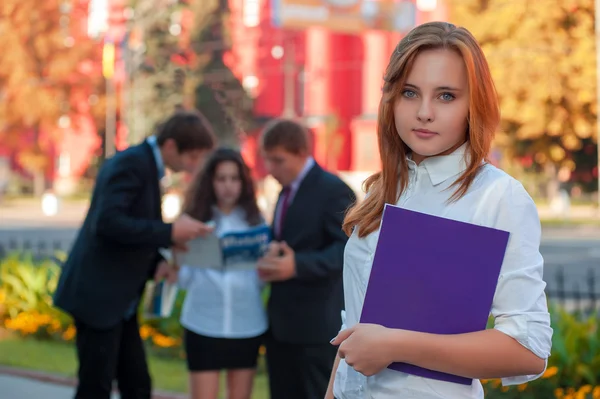 Students near the university building — Stock Photo, Image