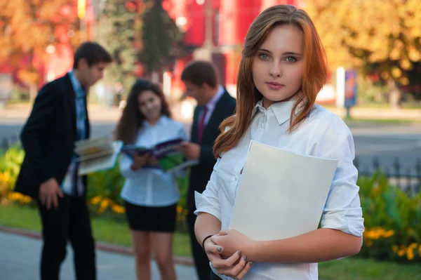 Students near the university building — Stock Photo, Image