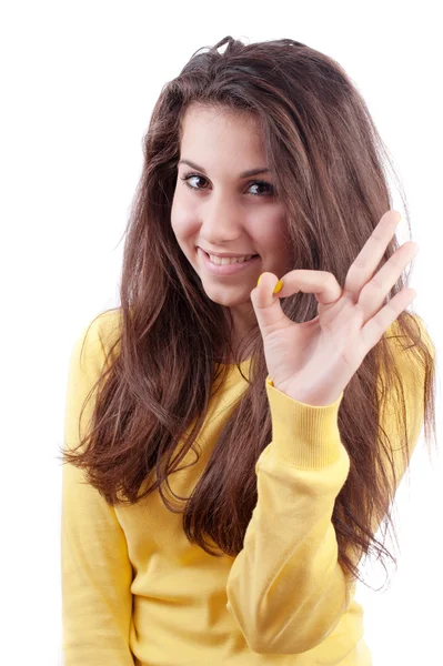 Beautiful girl in a yellow sweater — Stock Photo, Image