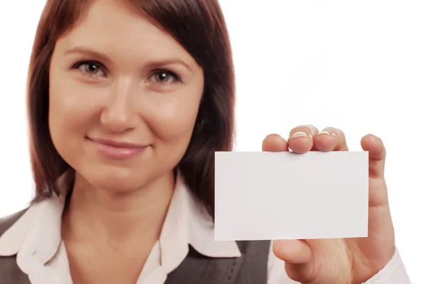 A beautiful woman holds out a business card — Stock Photo, Image