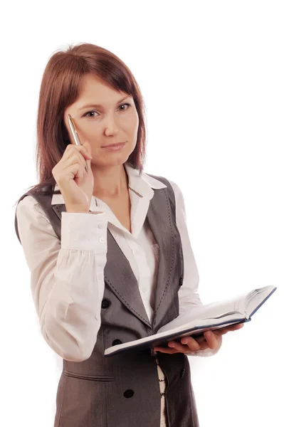 Portrait of thinking business woman with pen and paper, isolated on white background — Stockfoto