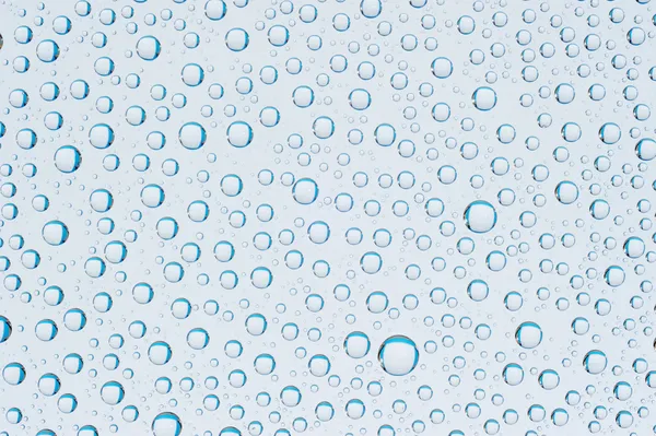 Blue water drops background — Stock Photo, Image