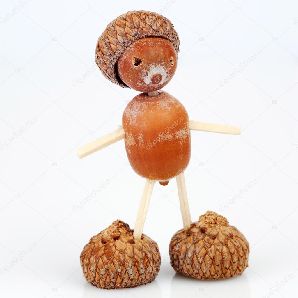 Figure made of acorns and matches