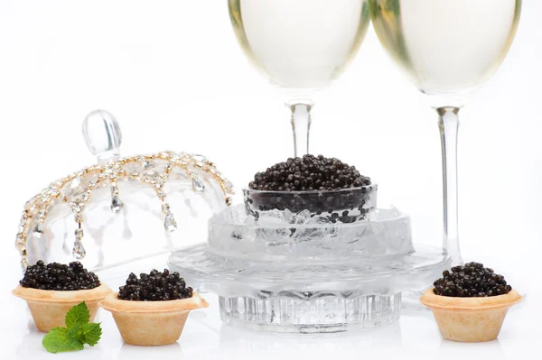 Champán y caviar negro — Foto de Stock