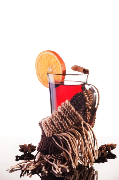 Mulled wine and scarf over white — Stock Photo, Image