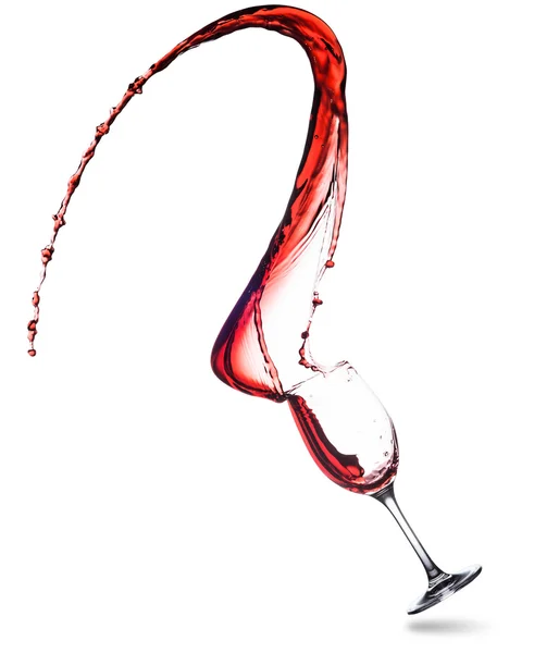 Espirro de vinho tinto em vidro — Fotografia de Stock