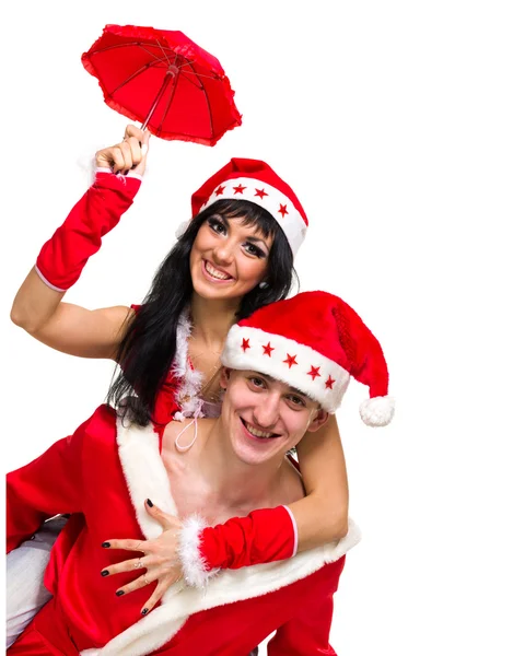 穿上圣诞老人衣服对快乐的夫妻 — 图库照片