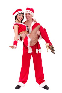 mutlu genç bir çift Noel Baba Giyim Eşyası