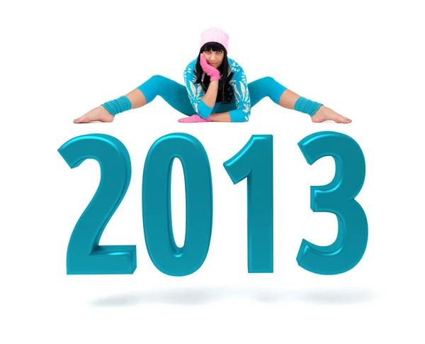Mujer joven y signo de Año Nuevo 2013 — Foto de Stock