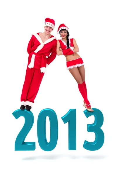 Para, noszenie ubrania Mikołaja na 2013 rok nowy znak — Zdjęcie stockowe
